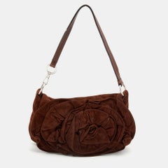 Yves Saint Laurent Baguette in pelle e camoscio marrone scuro con petali di rosa Nadja
