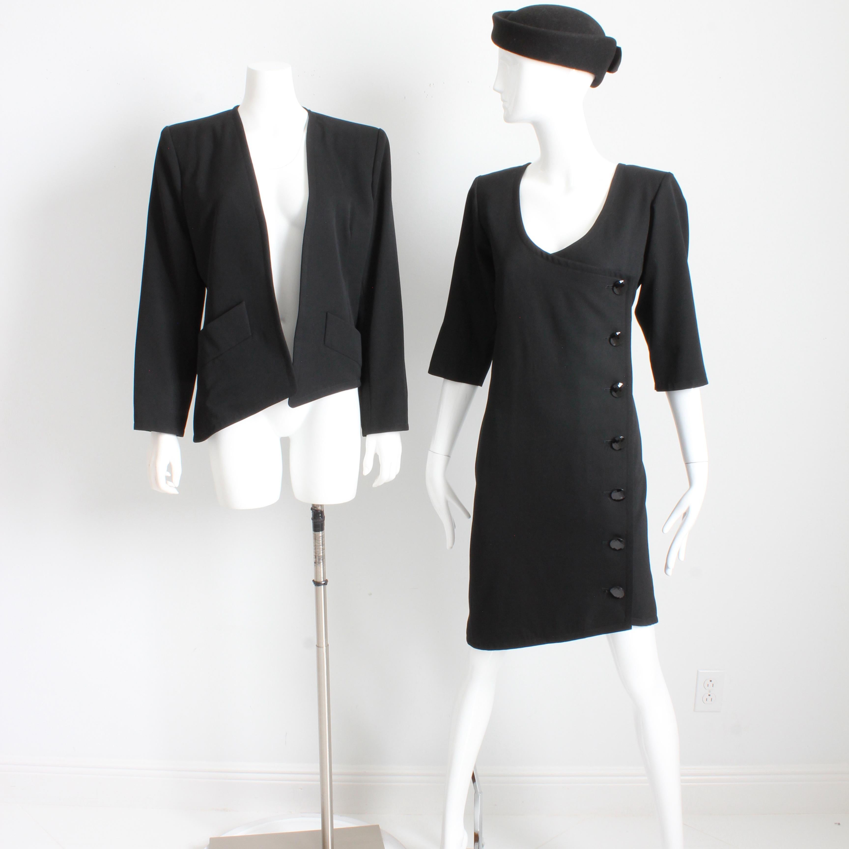 Authentic, preowned, vintage Yves Saint Laurent Rive Gauche dress and jacket, 2 pc set, likely made in the early 1990s. Made from black wool gabardine, both pieces are lined in black satin. The jacket has shoulder pads, pockets at the hips and is