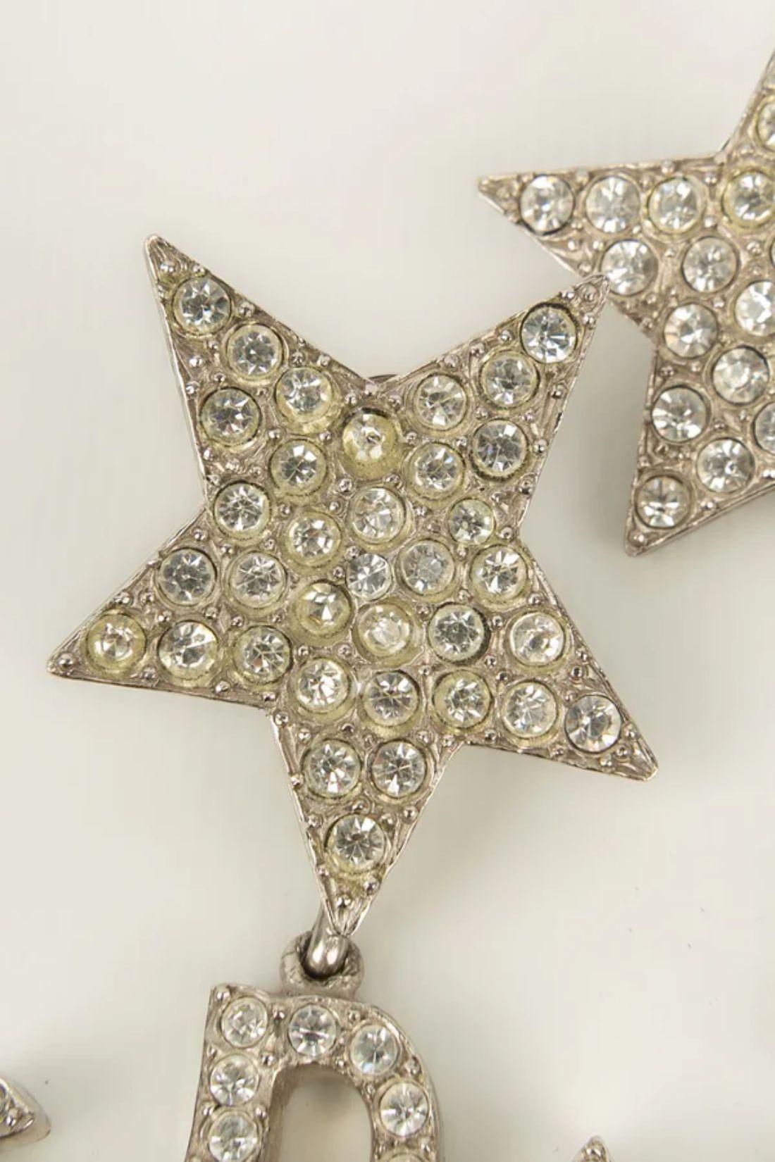 Orecchini Yves Saint Laurent in metallo placcato argento e tempestati di strass In condizioni ottime in vendita a SAINT-OUEN-SUR-SEINE, FR