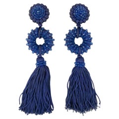 Boucles d'oreilles Yves Saint Laurent avec passementerie bleue