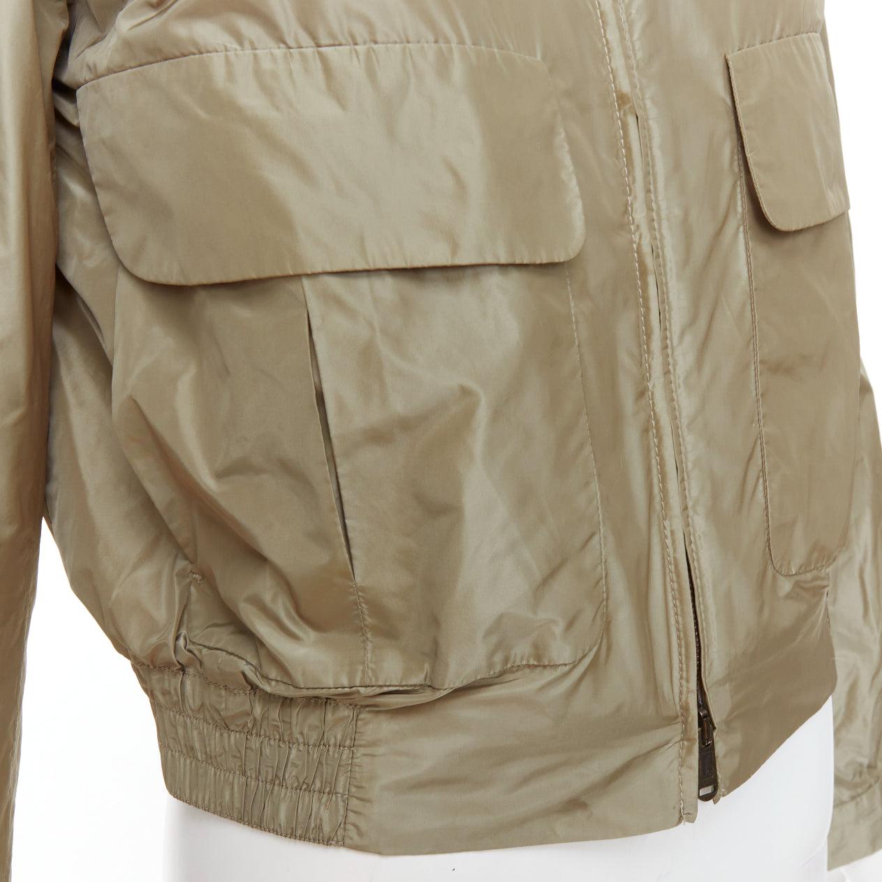 YVES SAINT LAURENT Edition 24 2009 Vintage fur collared nylon aviator jacket FR38 M
Reference: TGAS/E00535
Brand: Yves Saint Laurent
Collection: 2009 Edition 24
Material: Polyester, Fur
Color: Khaki, Cream
Pattern: Solid
Closure: Zip
Lining: Cream