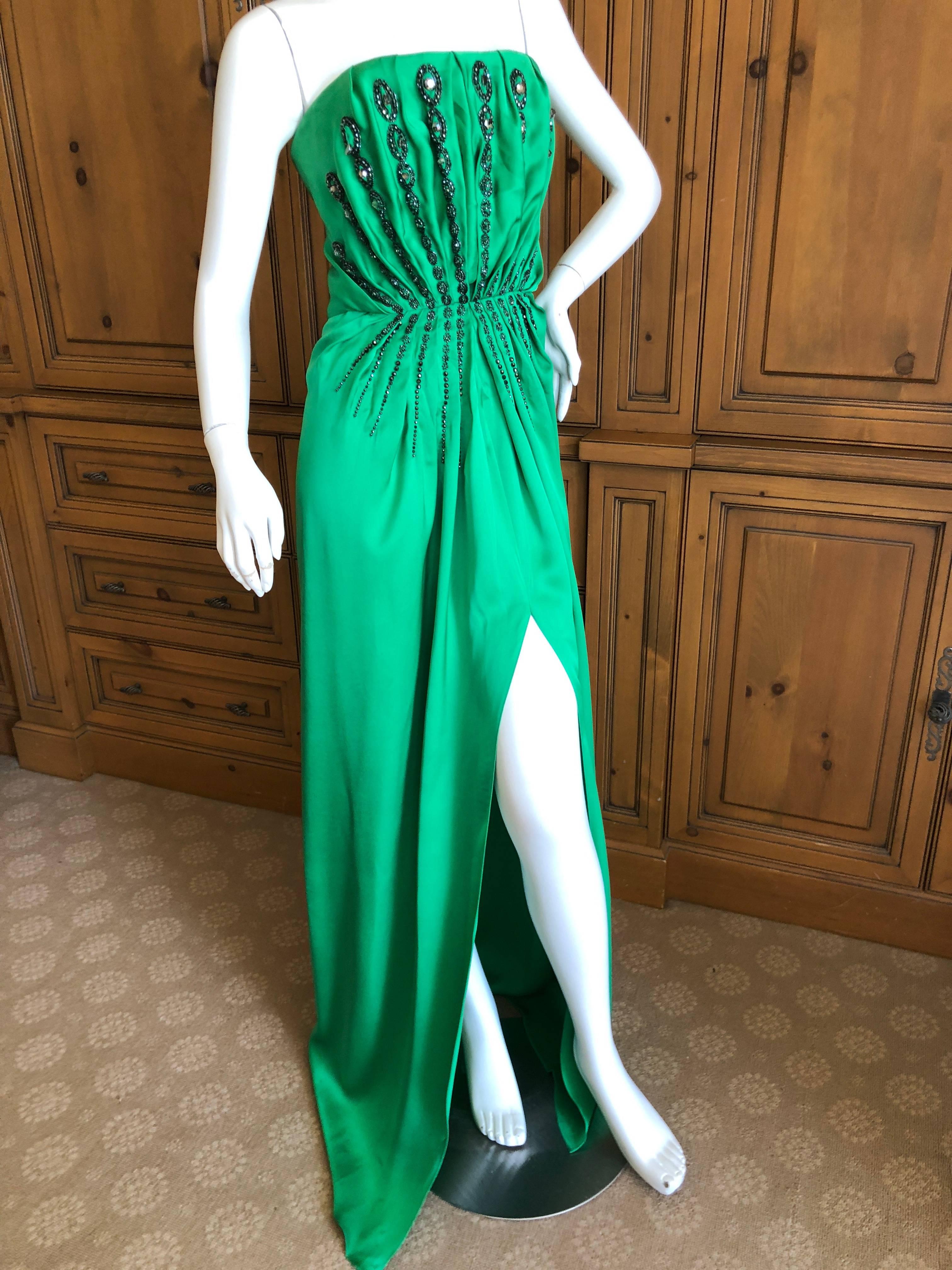 Yves Saint Laurent Edition Soir Embellished Green Silk Strapless Dress .
Zips up the back,With crystal and bead embellishments.
NWT 
Size 42
Bust 38