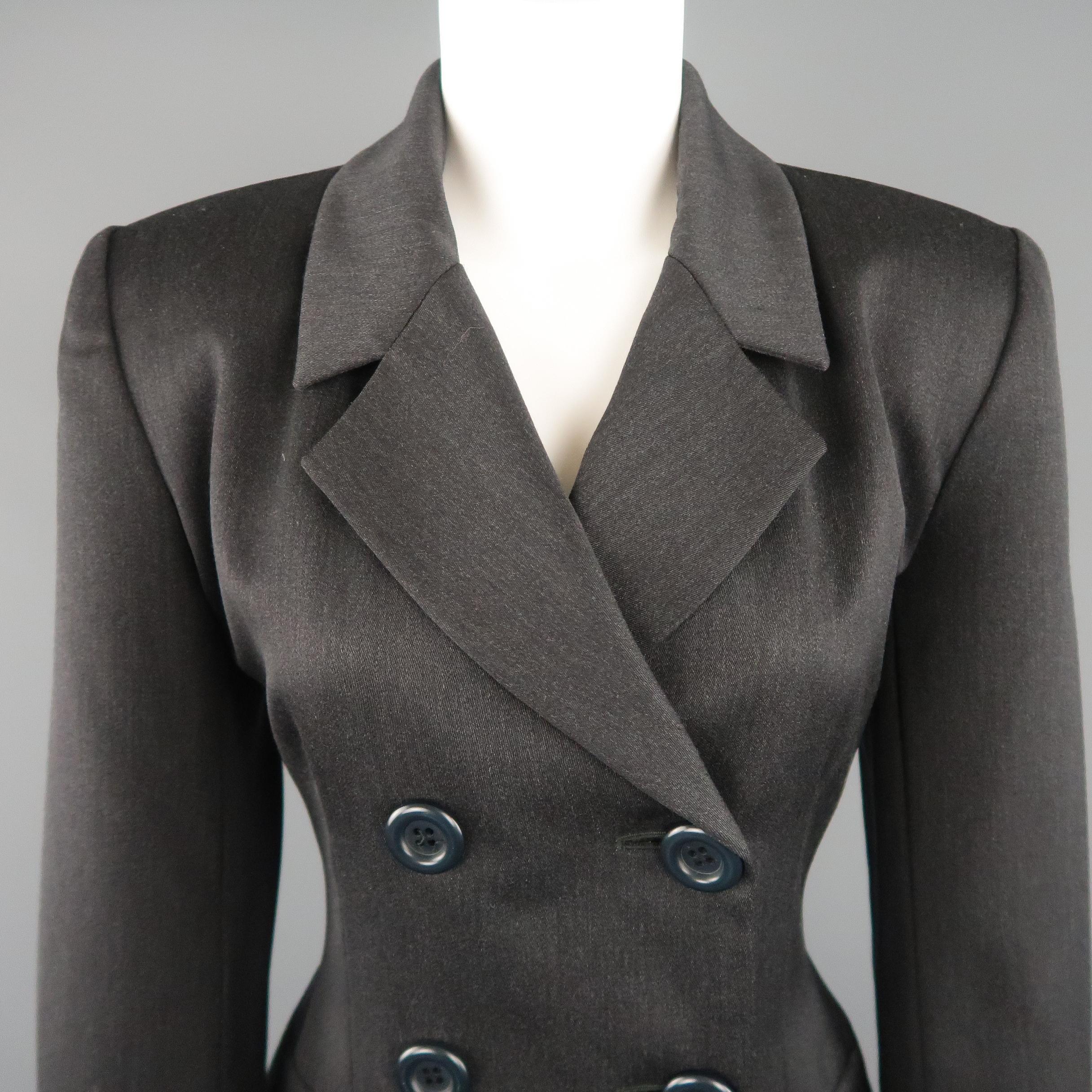 Vintage YVES SAINT LAURENT ENCORE sport jacket comes in charcoal fabric with a pointed lapel, padded shoulders, flap pockets, and double breasted closure with teal buttons. Made in France.
 
Excellent Pre-Owned Condition.
Marked: 6
 
Measurements:
