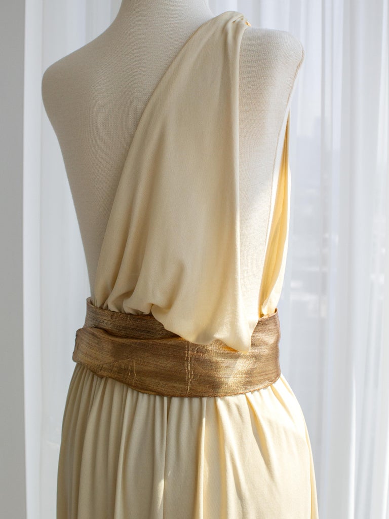 Yves Saint Laurent F/W 1975 Vintage Cream Gold Goddess Pleated Gown at  1stDibs
