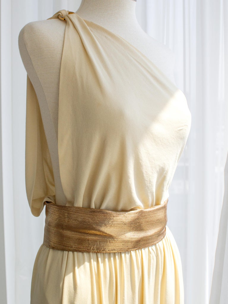 yves saint laurent cream dress Yves Saint Laurent F/W 1975 Vintage Cream Gold Goddess Pleated Gown at  1stDibs