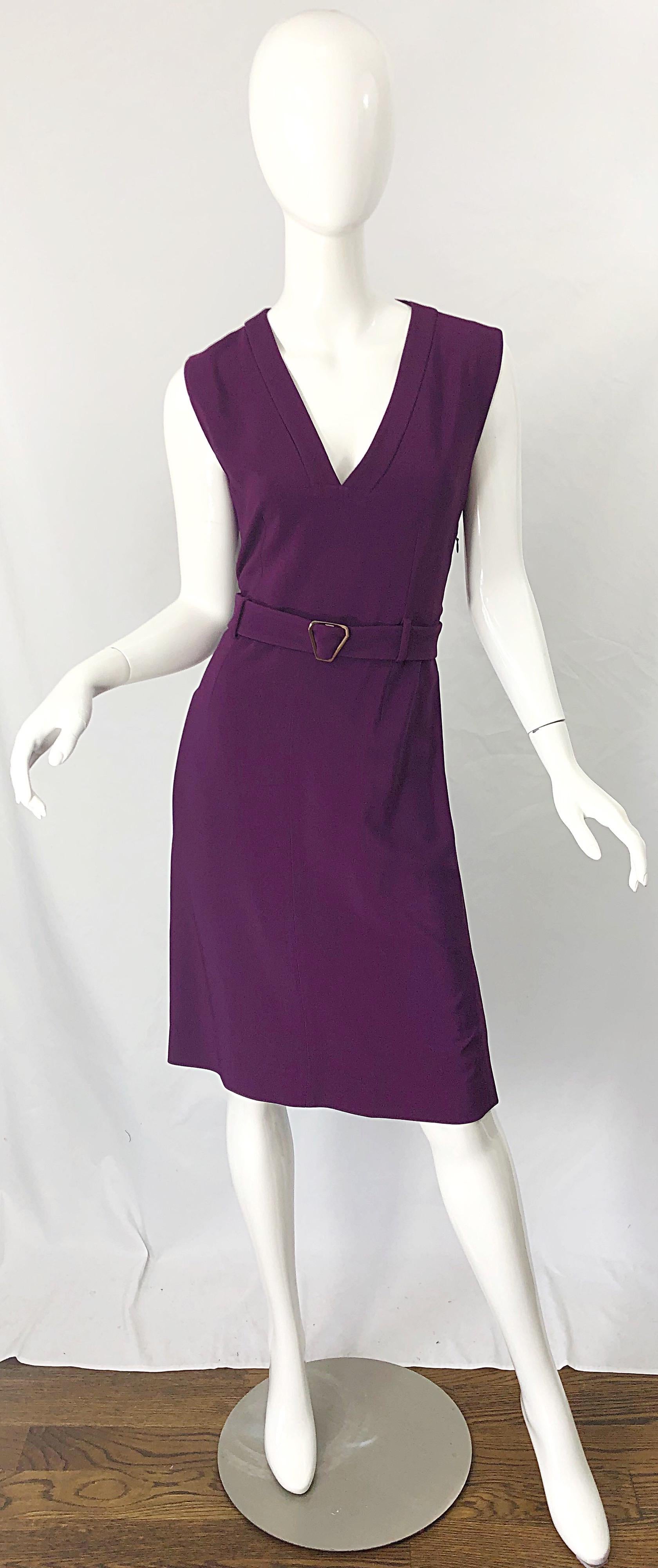 Chic YVES SAINT LAURENT Rive Gauche by Stefano Pilati purple belted sleeveless dress ! This dress is extra special as it hails from Pilati's final season at YSL.
Features a beautiful rich shade of purple. Detachable matching belt features a rose