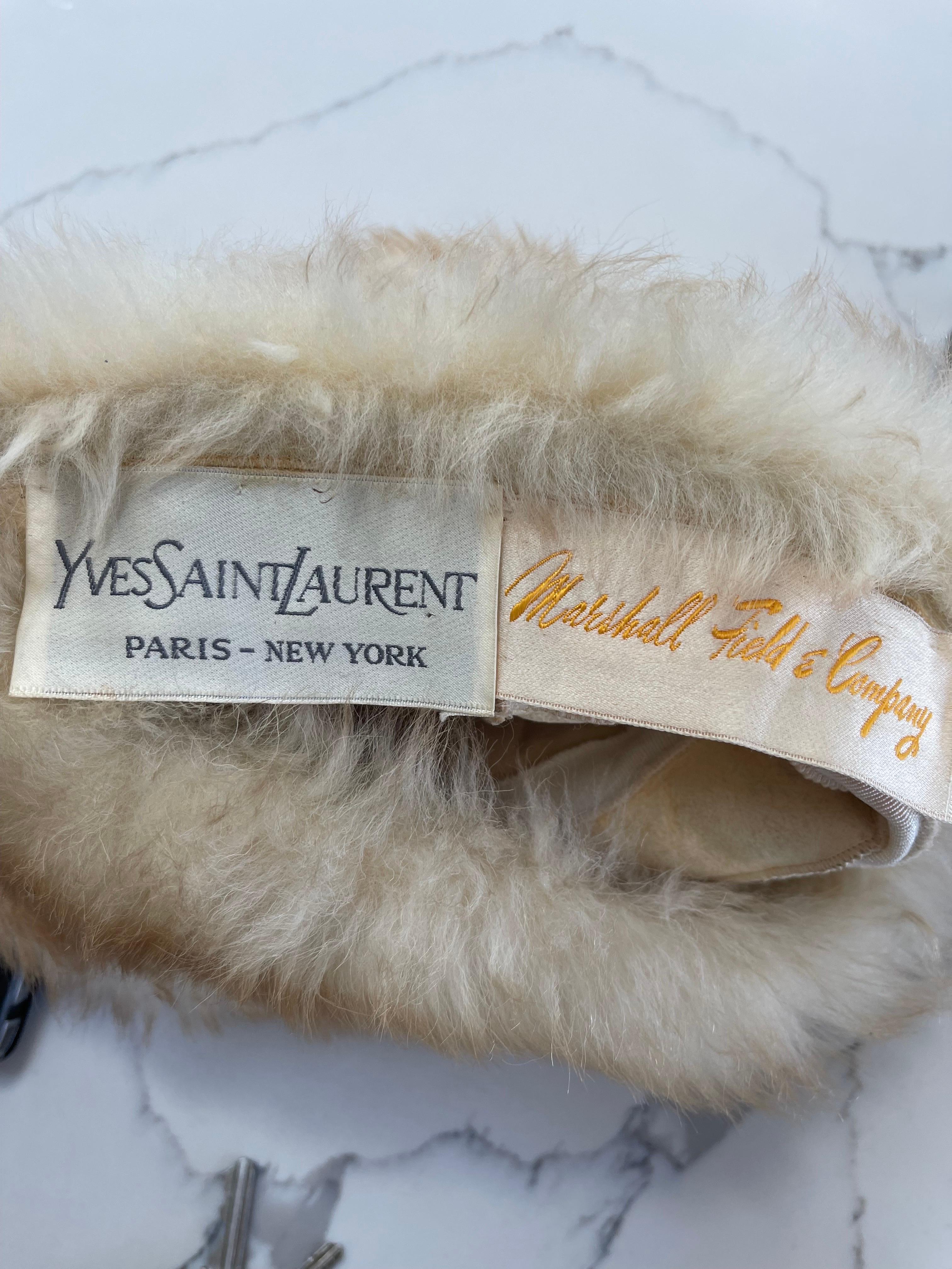 Rare vintage YSL Fall 1976 Russian Collection / Ballet Russes shearling fur hat ! Features a warm honey / light brown color. Soft and warm shearling. Pieces from this collection are extremely are, and are sought after by museums worldwide.
Perfect
