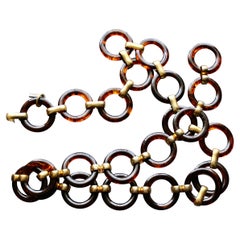 Yves Saint Laurent Ceinture/collier en fausse écaille de tortue et lucite