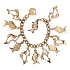 Vintage Yves Saint Laurent Fishes Bracelet in Gilted Metal