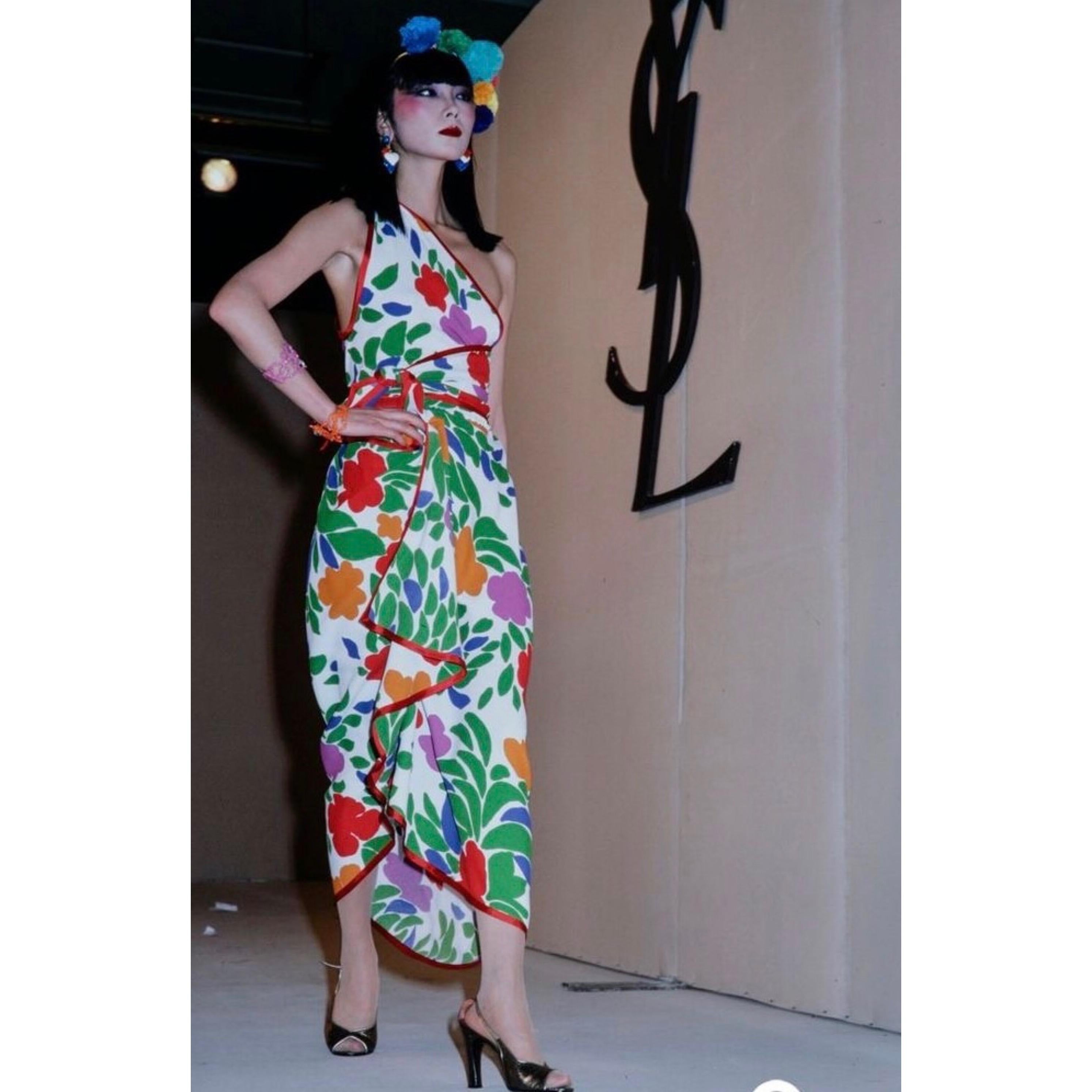 The late 1970s marked a playful design style for YSL. While several of his couture collections drew inspiration from famed artists, bolder and more casual prints also began to make their debut. From 1979, this sarong-style ensemble is made from a