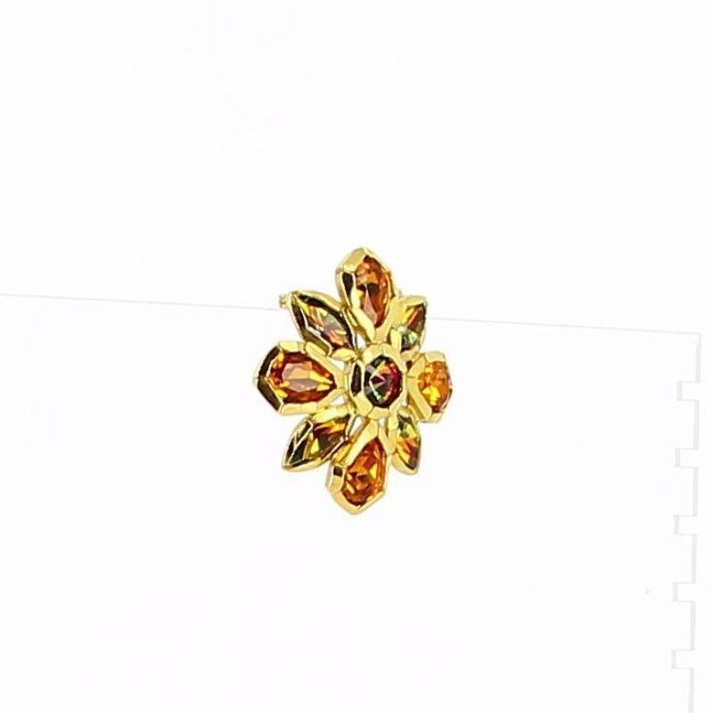 Yves Saint Laurent Flower Brooch

Very good conditon, show some light signs of use and wear but nothing visible. A beautifull piece to add in your closet !
Yves Saint Laurent Brooch in a form of a flower with Orange and yellow rhistone
Packaging :
