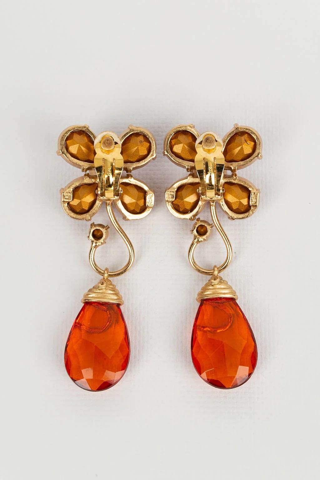 Artiste Boucles d'oreilles fleurs Yves Saint Laurent en vente