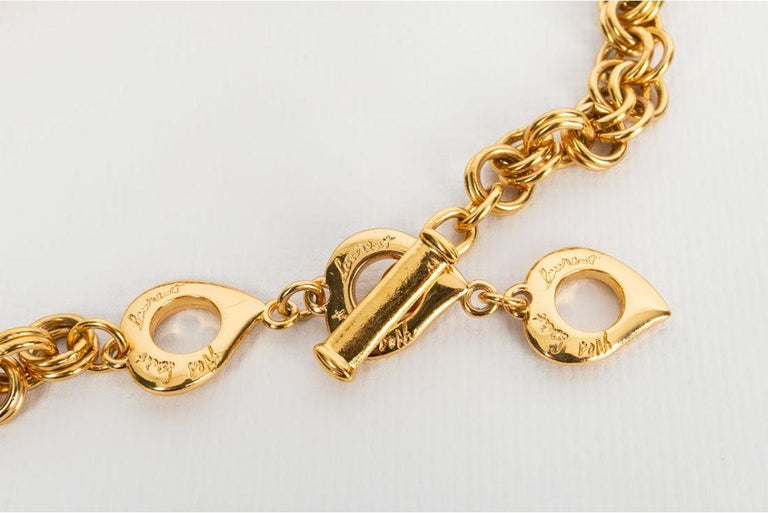 Pendentif YVES SAINT LAURENT En Métal Doré - Bijou Occasion Luxe