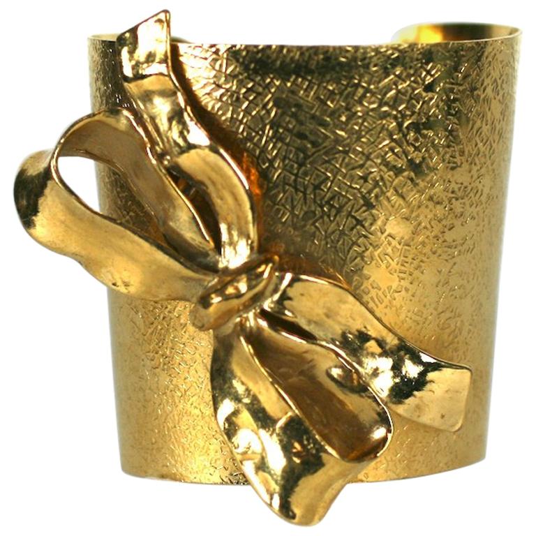 Yves Saint Laurent Gilt Bow Cuff For Sale