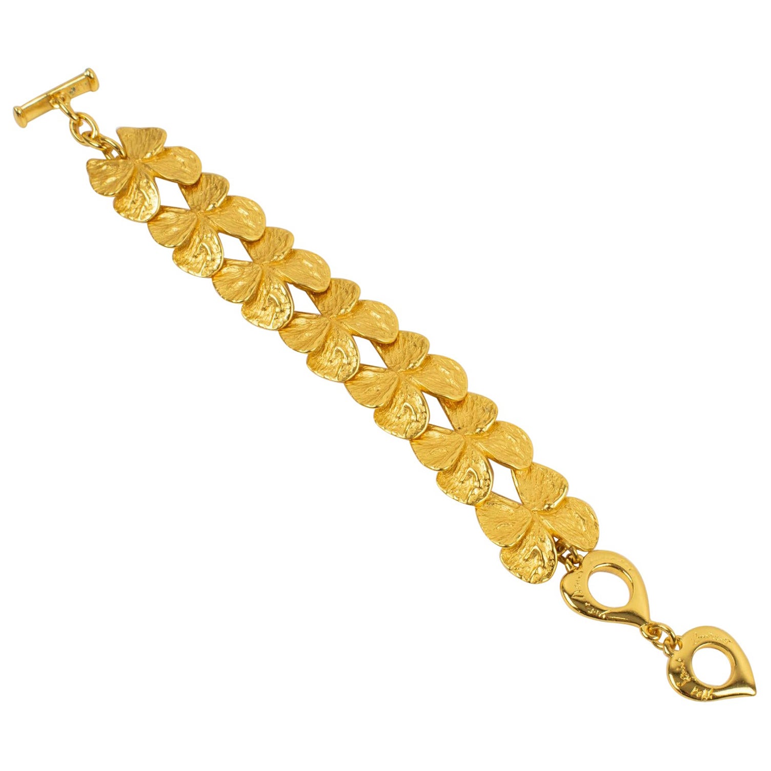 Yves Saint Laurent Bracelet à maillons papillons en métal doré en vente