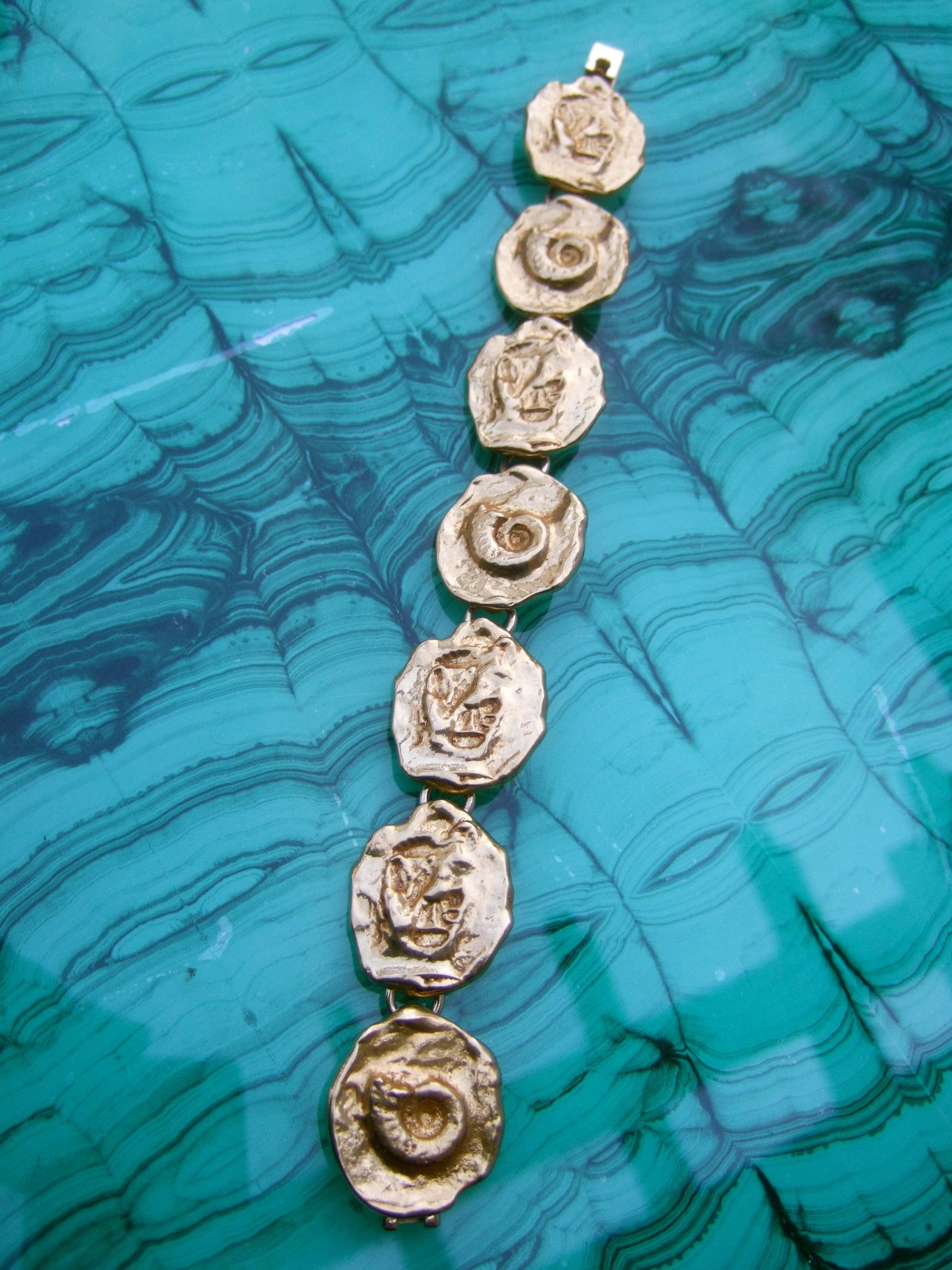 Yves Saint Laurent Gilt Metal Circular Medallion Link Bracelet c 1980s For Sale 7