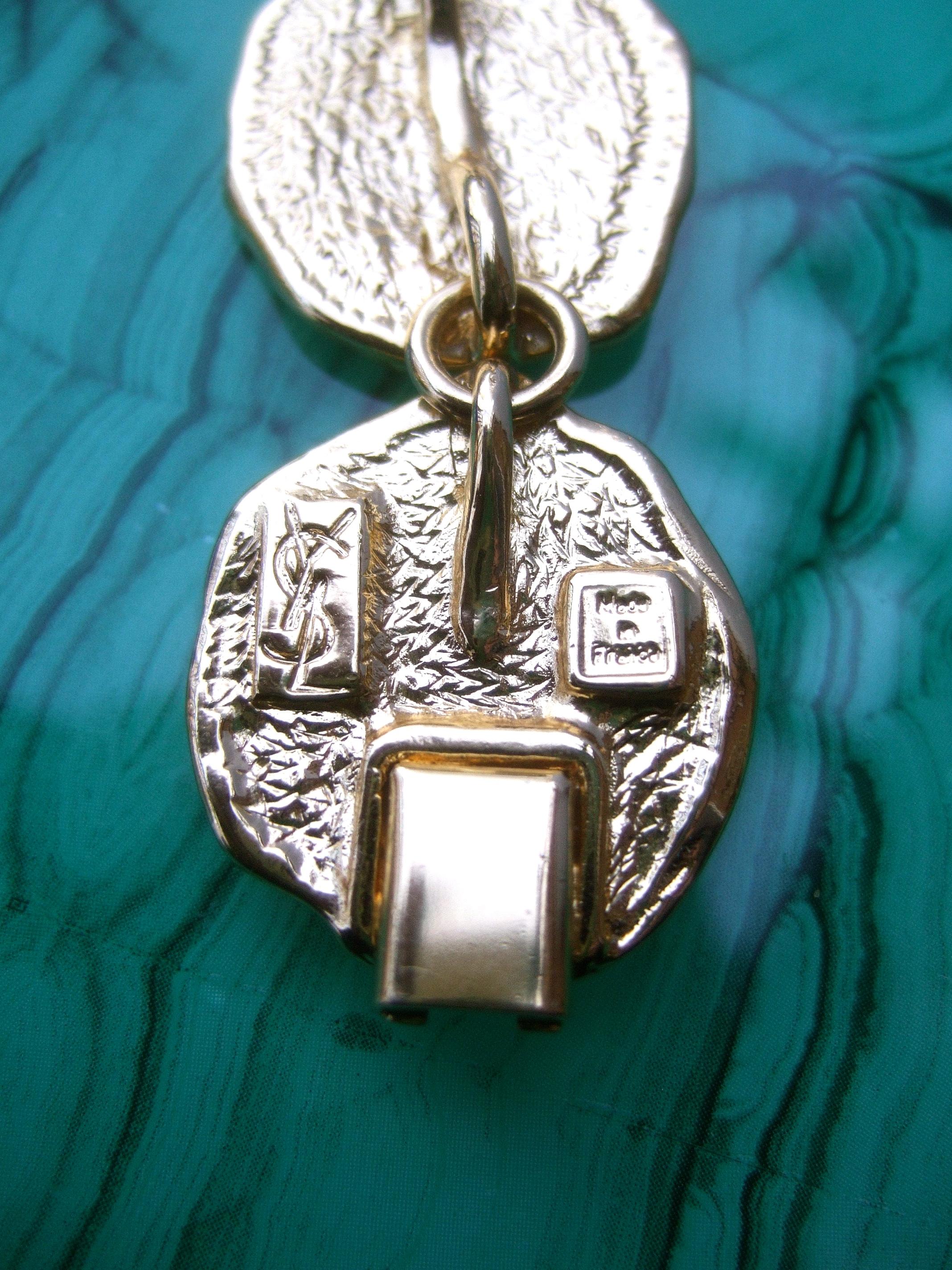 Yves Saint Laurent Gilt Metal Circular Medallion Link Bracelet c 1980s For Sale 9
