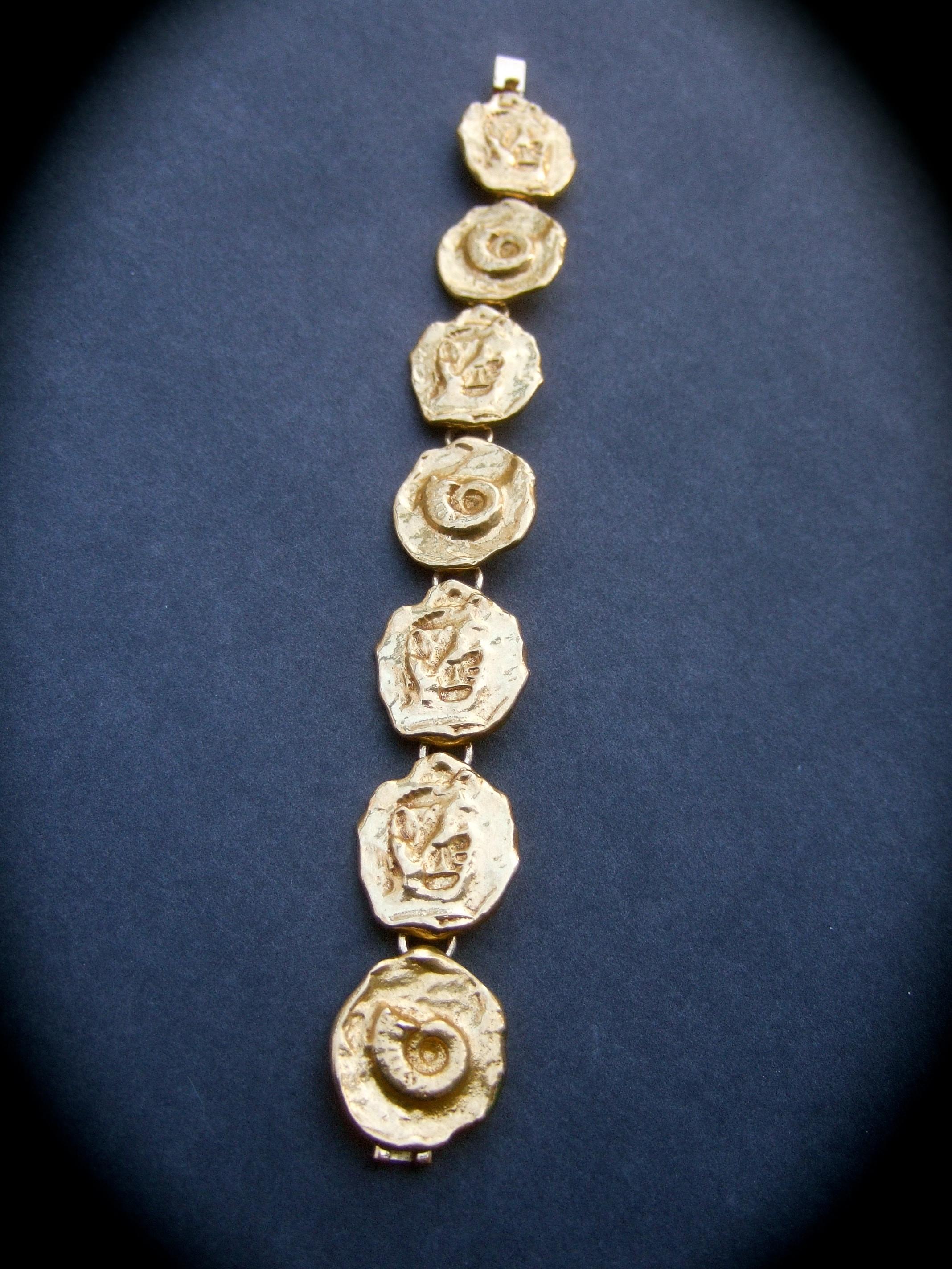 Modern Yves Saint Laurent Gilt Metal Circular Medallion Link Bracelet c 1980s For Sale