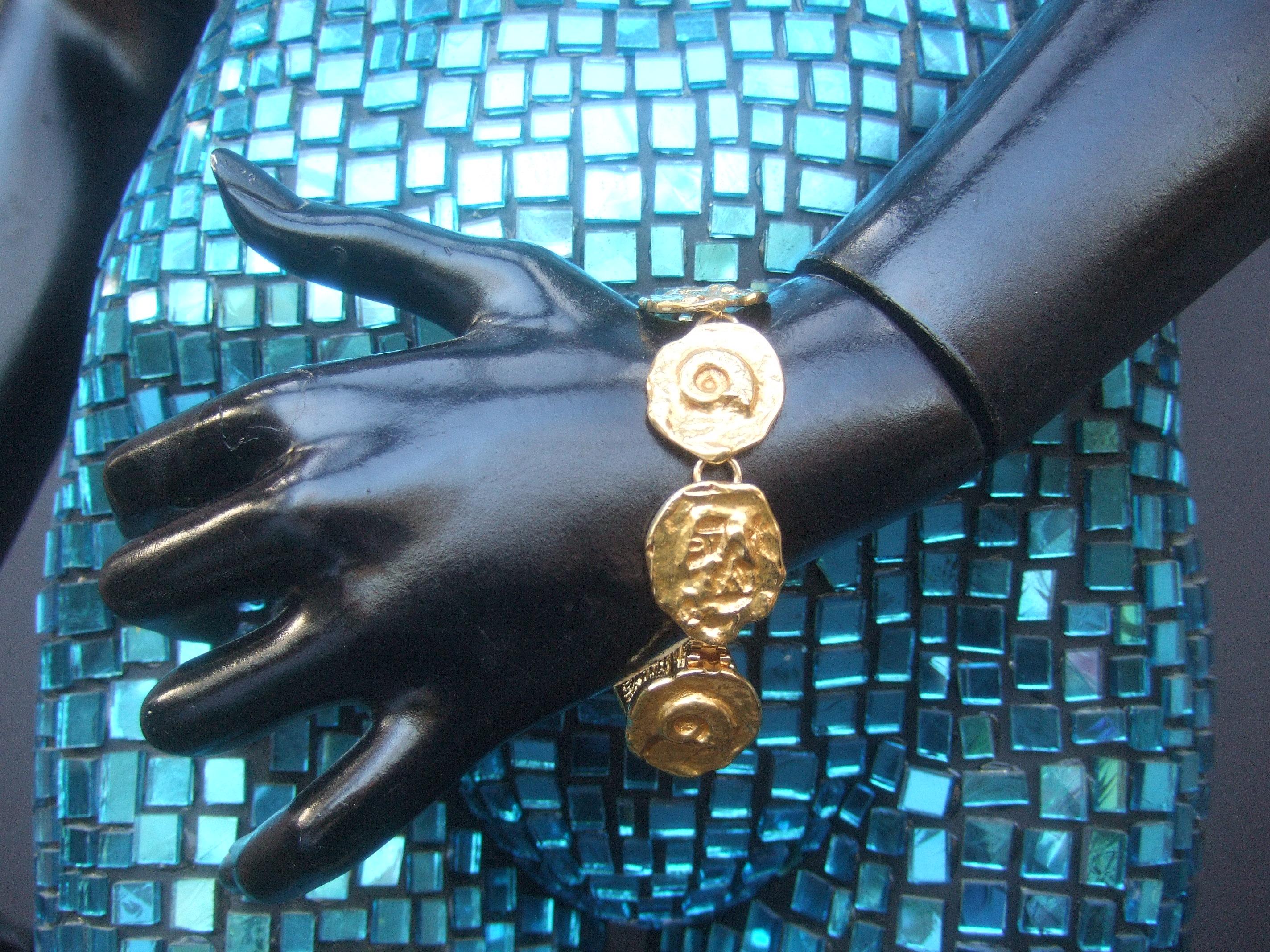 Women's Yves Saint Laurent Gilt Metal Circular Medallion Link Bracelet c 1980s For Sale