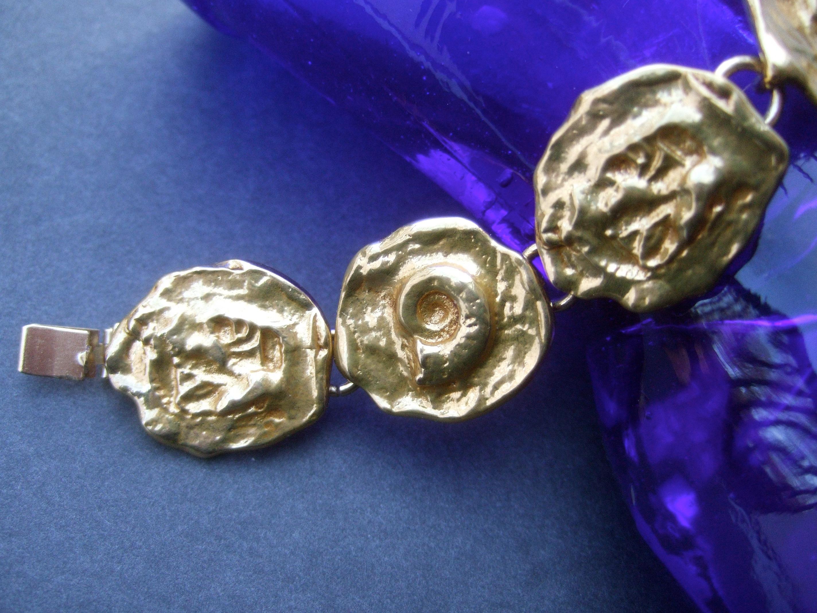 Yves Saint Laurent Gilt Metal Circular Medallion Link Bracelet c 1980s For Sale 4