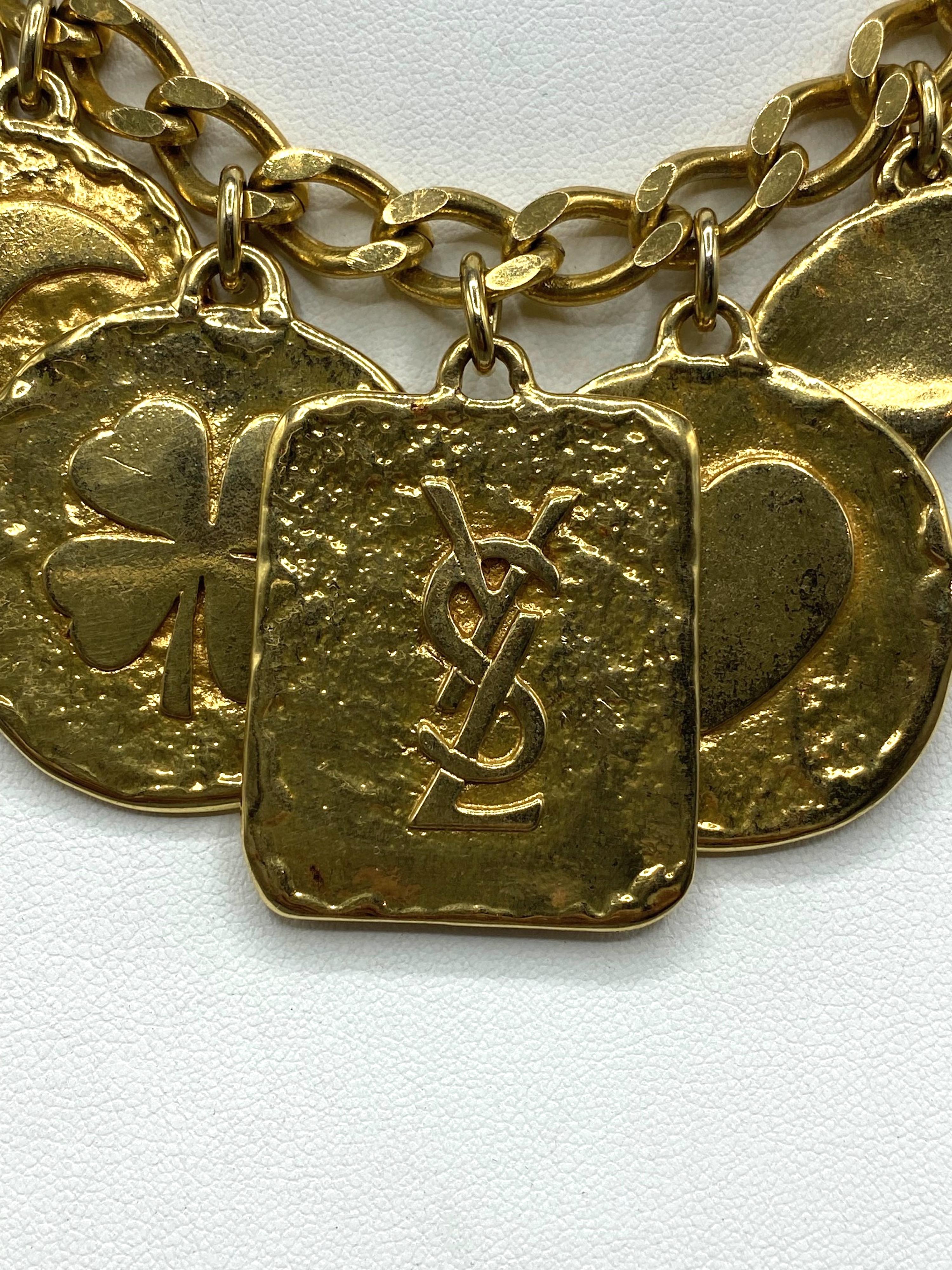 Yves Saint Laurent 1980s Gold Large Charm Necklace & Bracelet Set In Good Condition In New York, NY