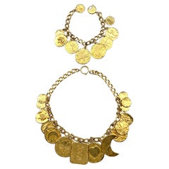 Yves Saint Laurent 1980s Gold Large Charm Necklace & Bracelet Set