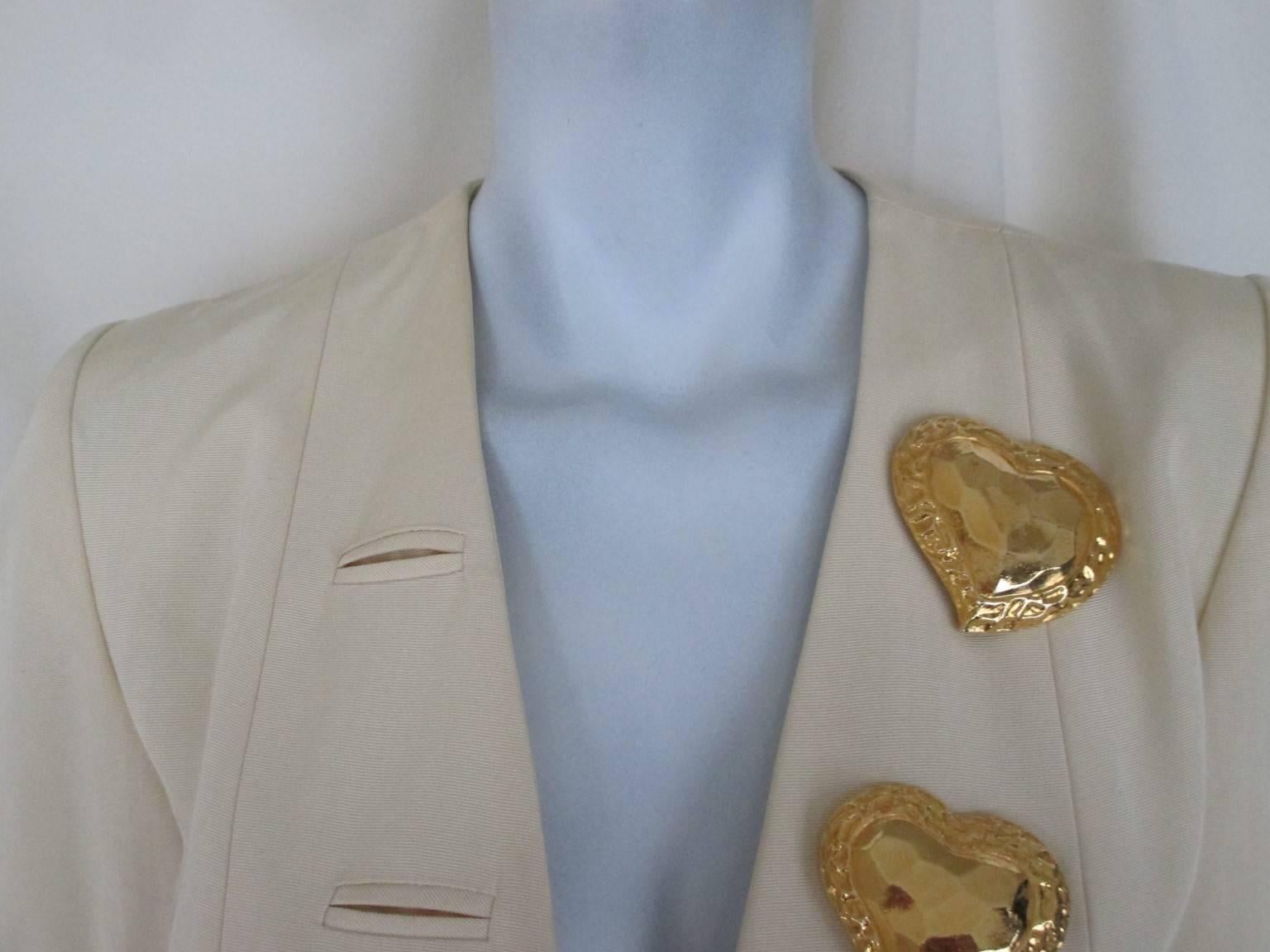 Vintage YSL jacket with 4 gold color heart buttons
no pockets
Its in very good vintage condition
Size is france 40 and US 8
