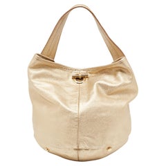 Yves Saint Laurent Gold Leather Hobo