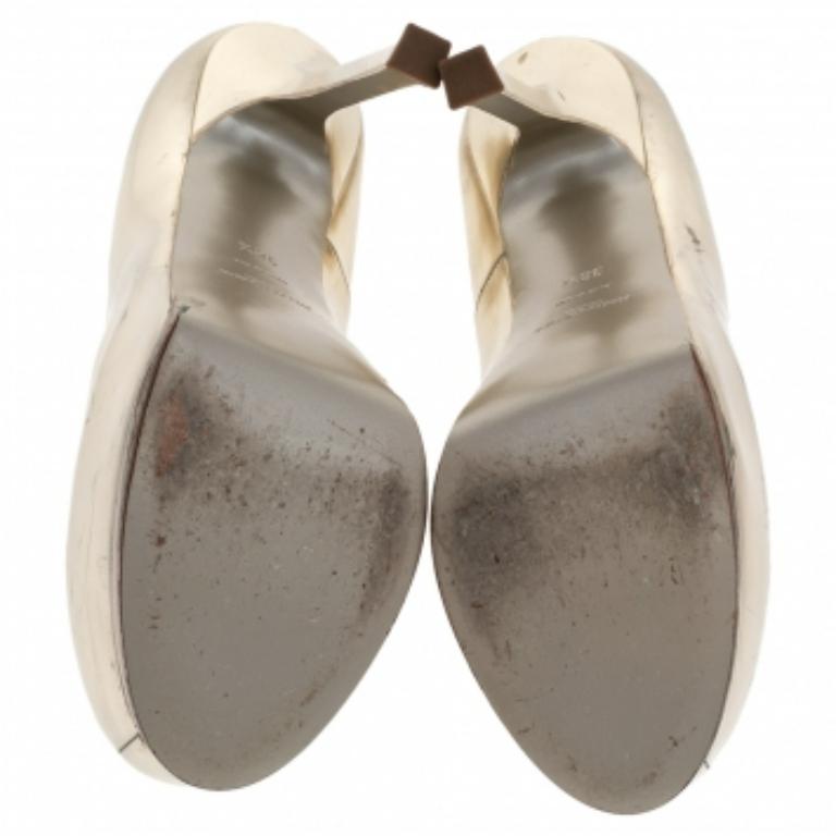 De las mujeres Yves Saint Laurent Bombas de plataforma Tribtoo de piel dorada talla 38.5 en venta