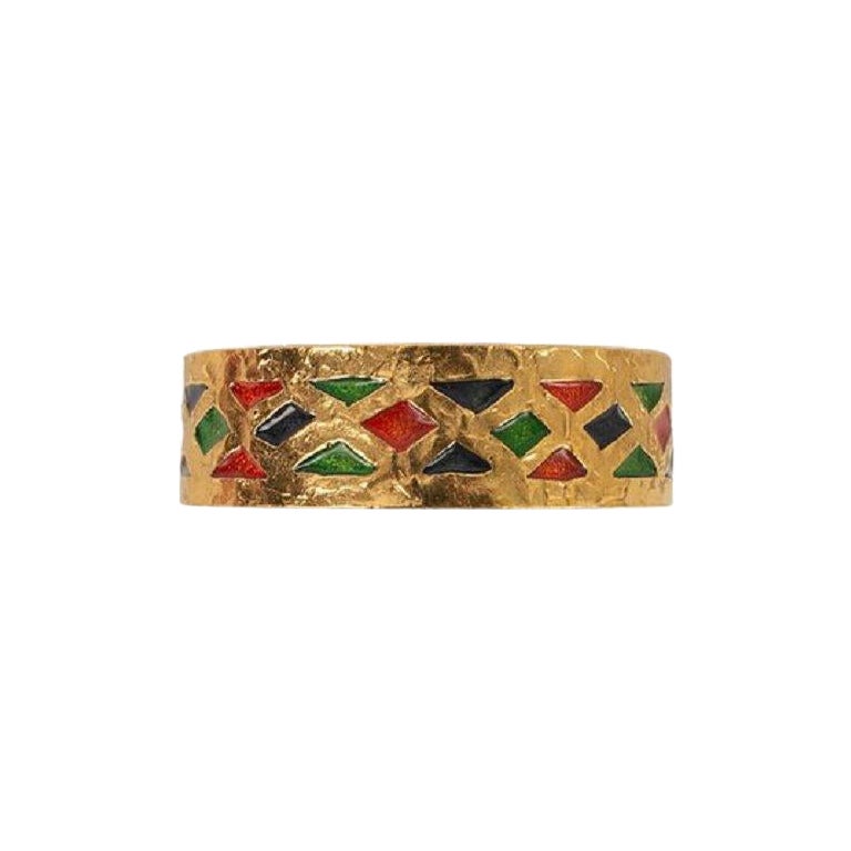 Pulsera Yves Saint Laurent de metal dorado y esmalte en venta