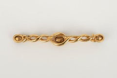 Yves Saint Laurent Gold Metal Brooch with Red and Blue Rhinestones