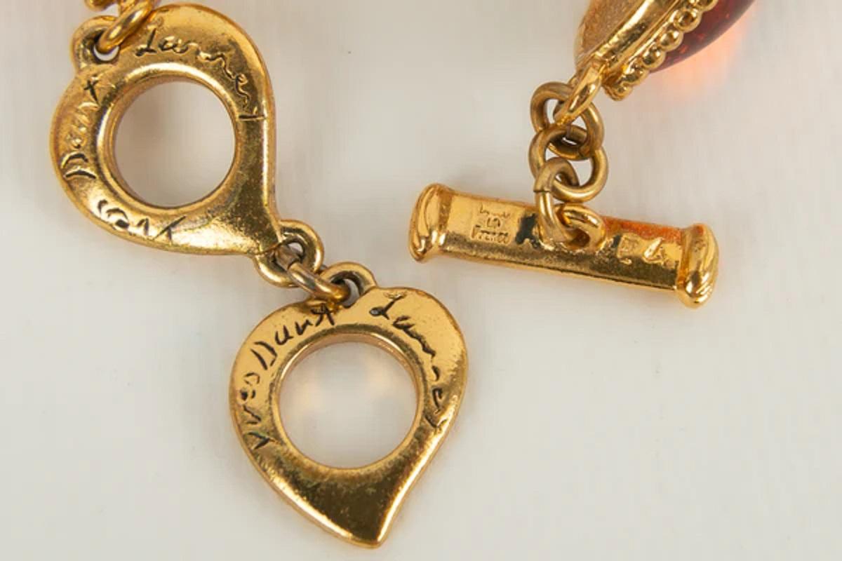 Yves Saint Laurent, bracelet en métal plaqué or et résine colorée Pour femmes en vente