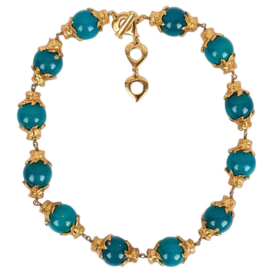 Yves Saint Laurent, collier en métal plaqué or avec perles en bois