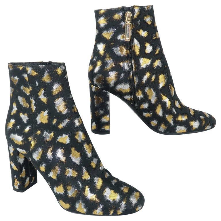 Yves Saint Laurent leopard-print boots, offered by Modern & Moore 