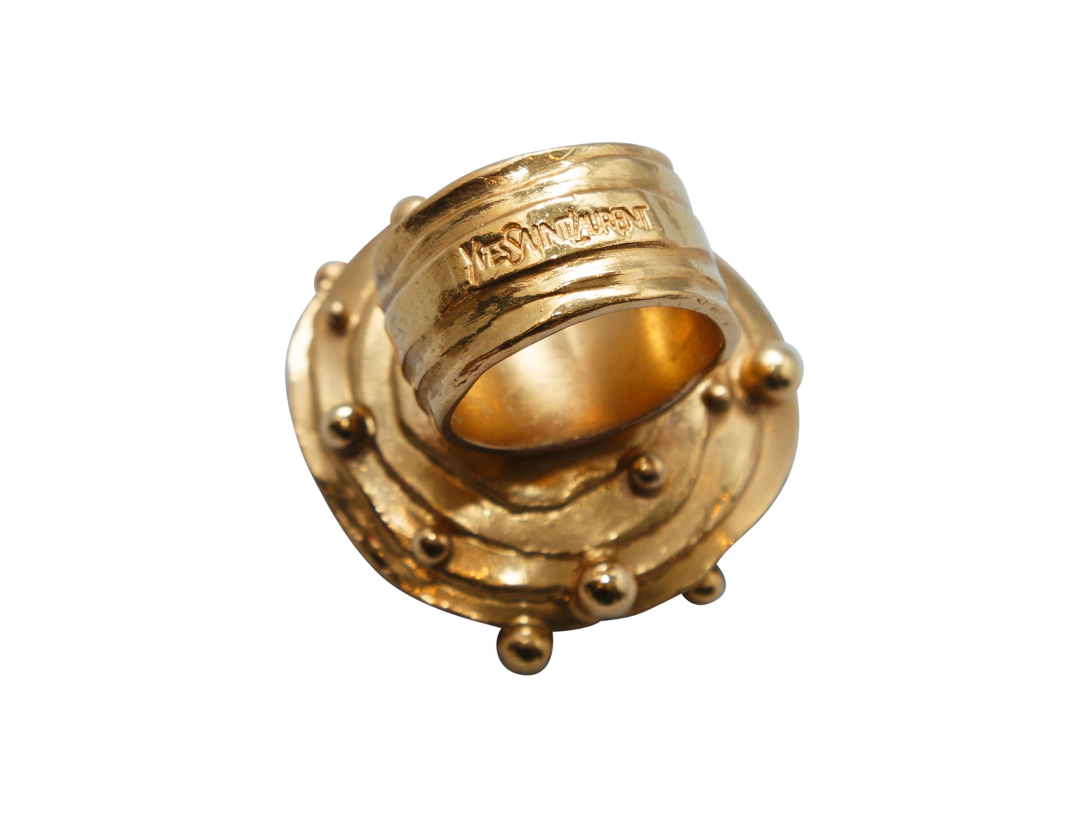 Product details: Gold-tone circular oversize ring by Yves Saint Laurent. Wide band. 1.38