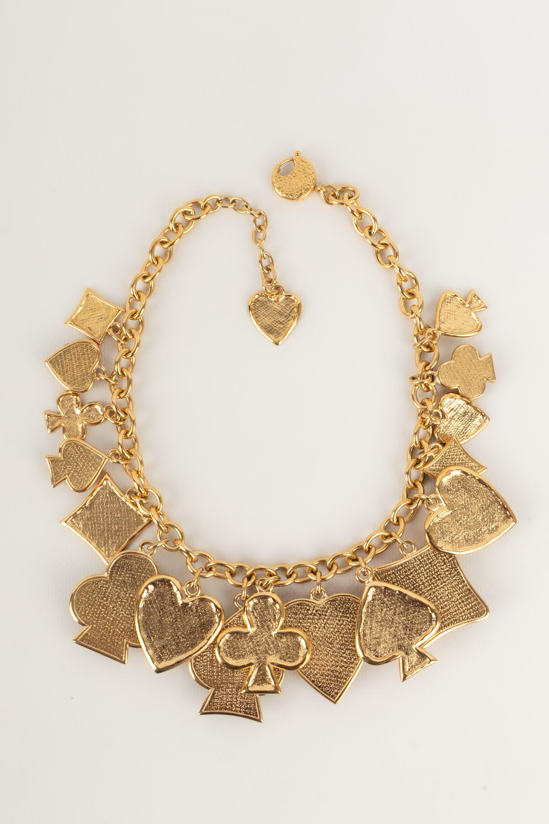 Yves Saint Laurent Golden Metal and Resin Charm Necklace For Sale 3