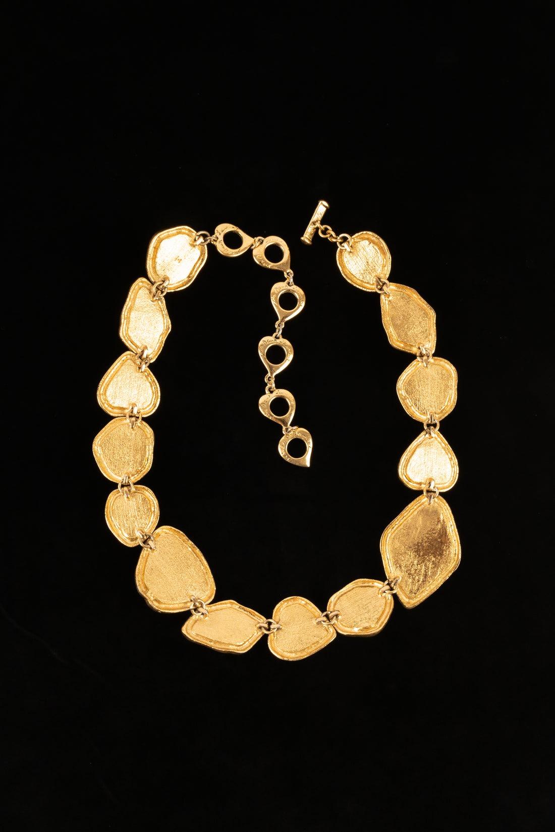 Yves Saint Laurent - (Made in France) Collana articolata in metallo dorato con cabochon in resina colorata.

Informazioni aggiuntive:
Condizioni: Ottime condizioni
Dimensioni: Lunghezza: da 46 a 58 cm

Riferimento del venditore: BC213