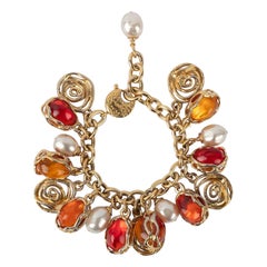 Bracciale in metallo dorato Yves Saint Laurent