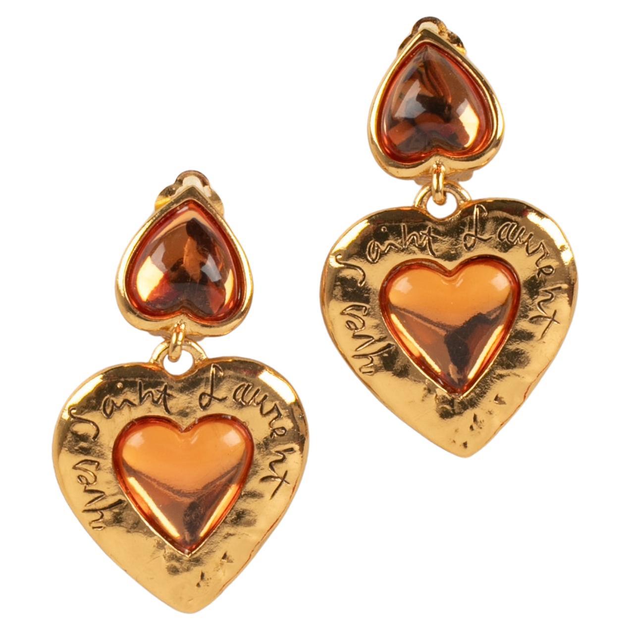 Yves Saint Laurent Golden Metal Clip-On Earrings with Orange Resin For Sale