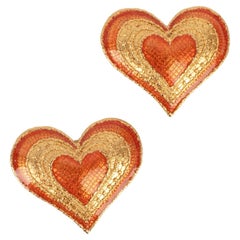 Yves Saint Laurent Golden Metal Clip-On Earrings with Representing Hearts, 1980s