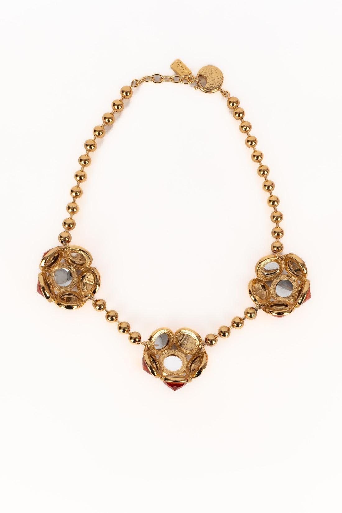 Yves Saint Laurent - (Made in France) Collana in metallo dorato con strass arancioni e verdi.

Informazioni aggiuntive:
Condizioni: Ottime condizioni
Dimensioni: Lunghezza: da 46 a 49 cm

SKU:BC119