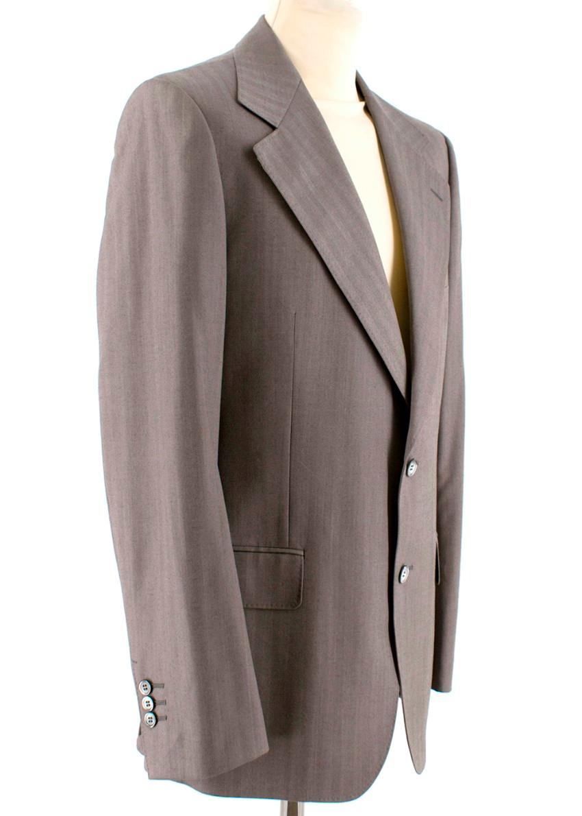 Yves Saint Laurent Grey Striped Wool Suit

Jacket
- Two front pockets and one breast pocket
- One internal button up pocket, one internal open pocket and small pen pocket
- Two button closure
- Three button sleeve closure

Trousers
- Flap button