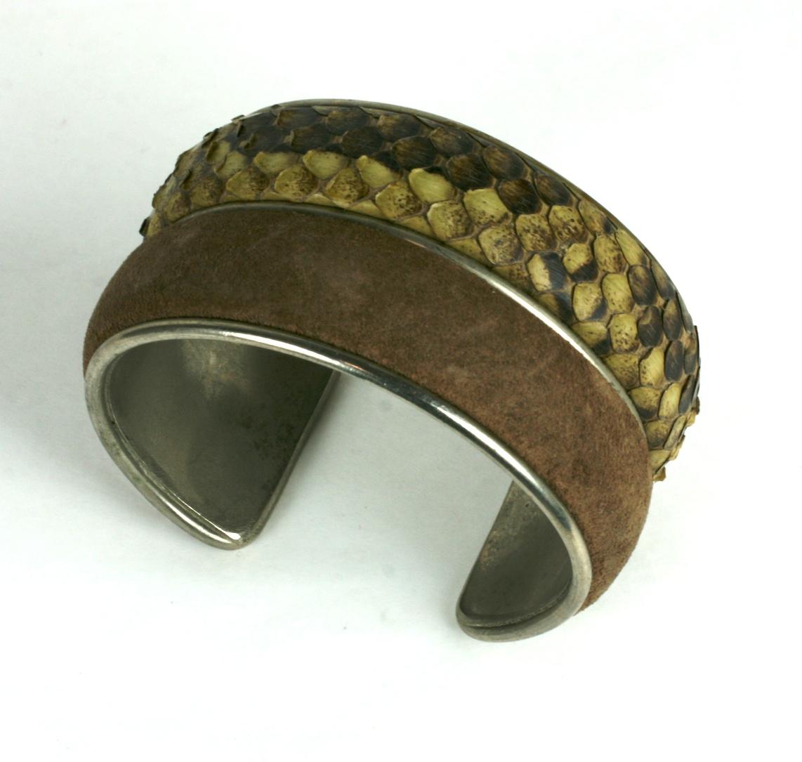 Super Chic Yves Saint Laurent Haute Couture 1980 Cuff Bracelet. Of darkened silver plated bronze, padded snakeskin and chestnut suede. 2 different textures beautifully underlaid with padding so each is dimensional. These are the small unseen details