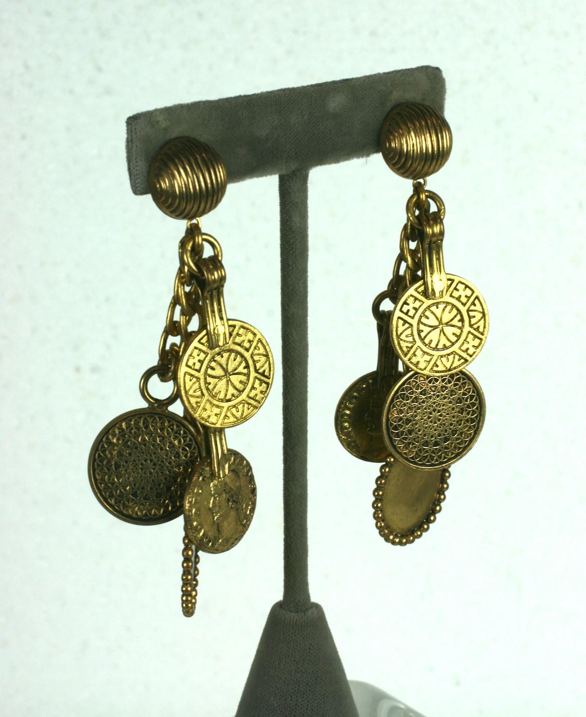 Super rare Maison Goossens for Yves Saint Laurent Haute Couture. Moroccan antique Byzantine multi coin ear clips. Of antiqued gilt plate bronze castings. Fall Winter 1969 YSL Haute Couture. 
Excellent Condition, Signed YSL. 
L
W