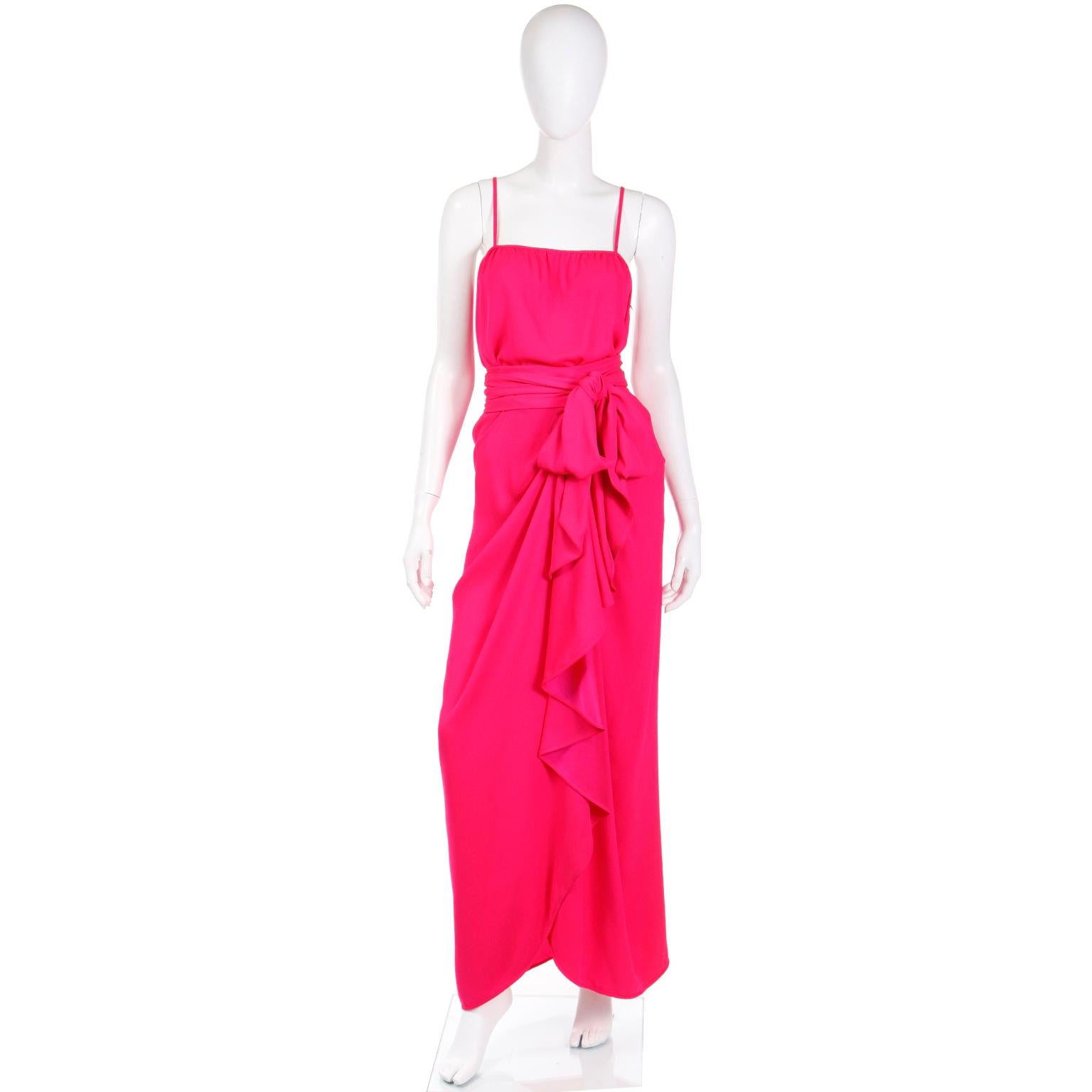This is vintage Yves Saint Laurent Haute Couture bright pink 2 piece evening dress is so breathtaking in person! This one of a kind YSL ensemble includes a camisole and a long wrap ruffled skirt. Yves Saint Laurent created this style often,