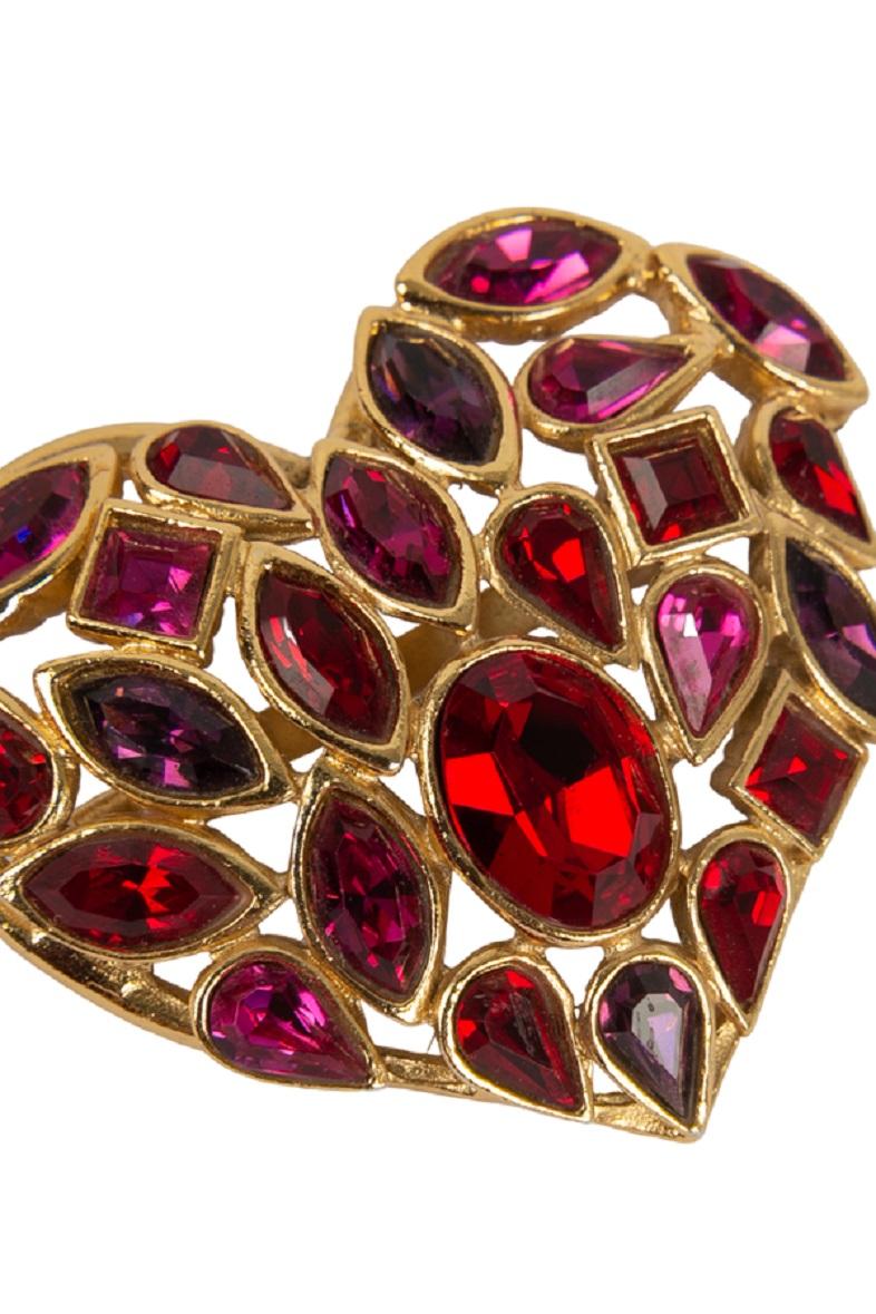 Yves Saint Laurent - Openwork gold metal pendant brooch with red rhinestones.

Additional information:

Dimensions: 
5 H cm
Condition: 
Very good condition
Seller Ref number: BR60