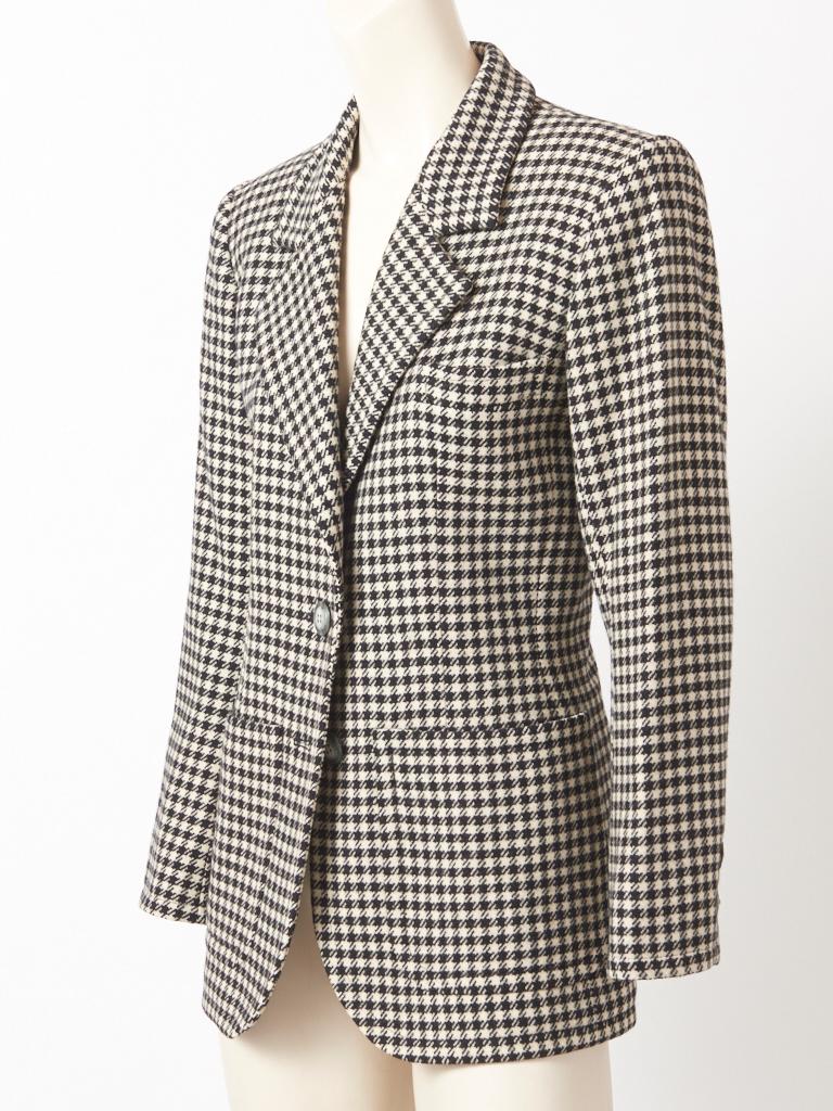 Yves Saint Laurent,  Rive Gauche, black and white, wool, Houndstooth , pattern Blazer, having large patch pockets, medium sized lapels and a two button closure.