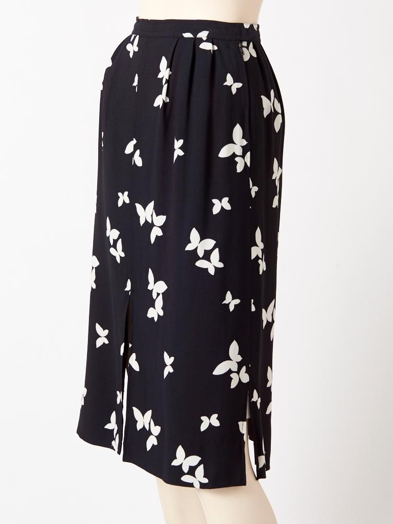 Yves Saint Laurent, rive gauche, black and white crepe, iconic butterfly print skirt, having a side zipper closure with a front middle slit at the hem and a slit at each side.