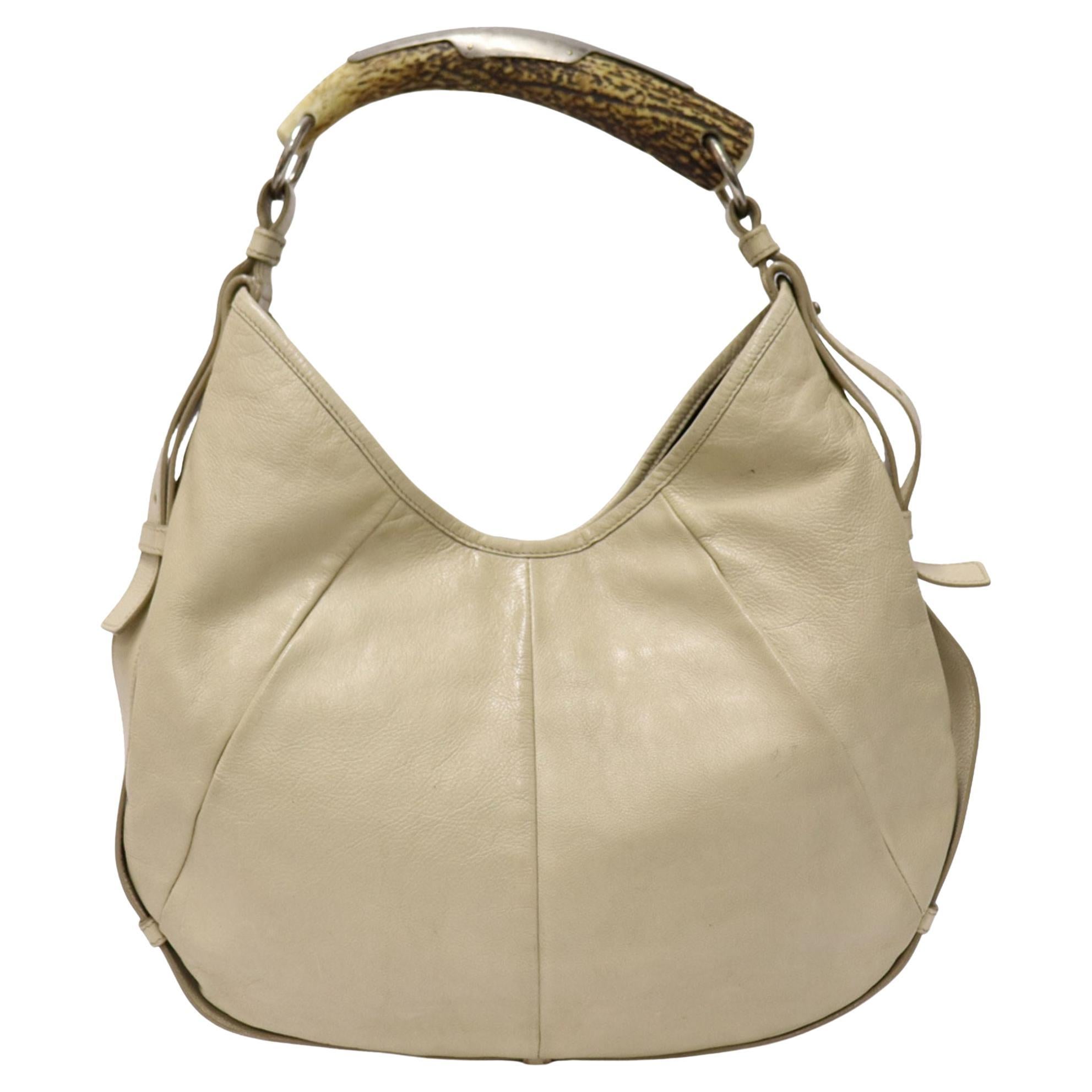 Sold at Auction: Saint Laurent Brown Le Monogramme Crossbody Sling Bag