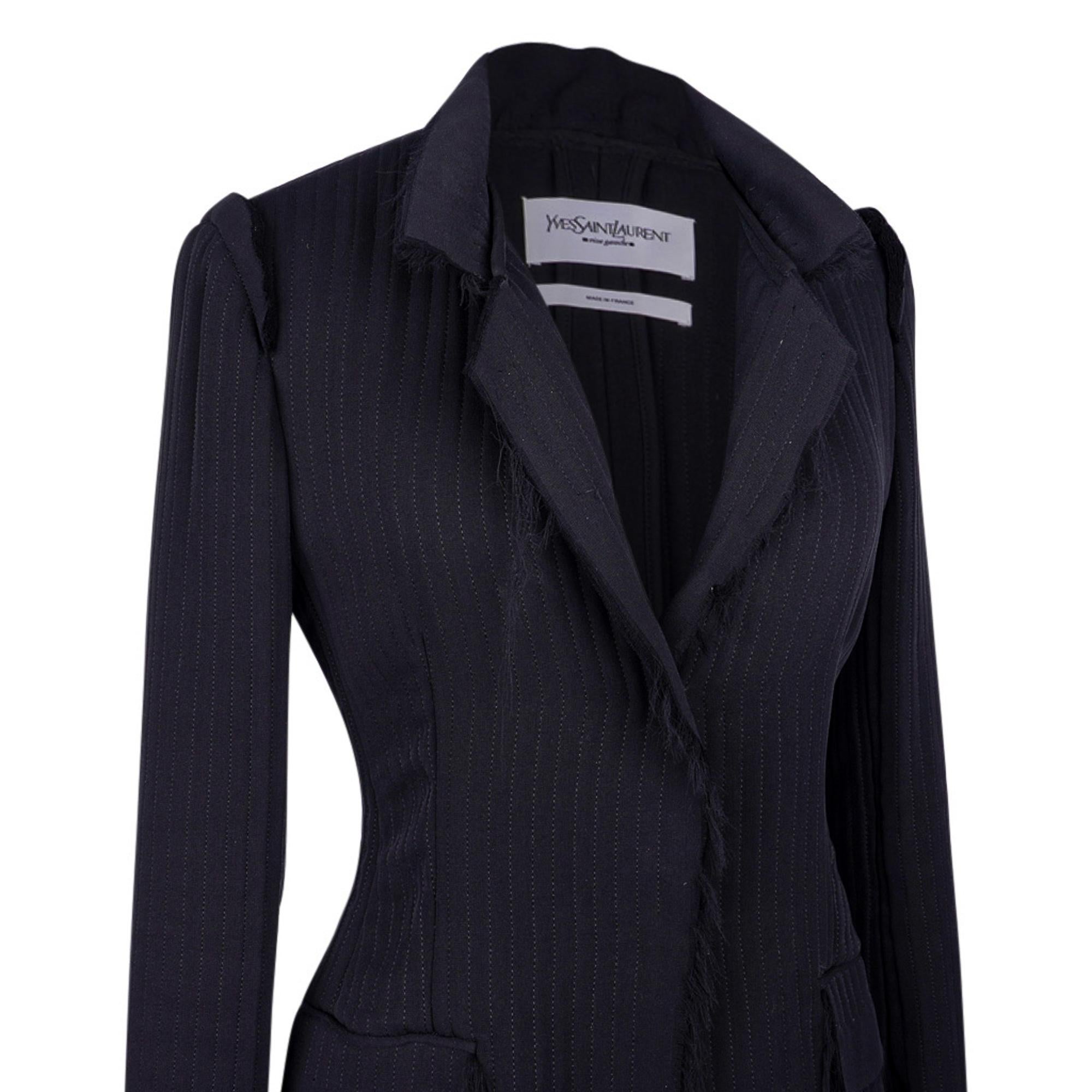 Guaranteed authentic Yves Saint Laurent Tom  Ford iconic jacket!  The MOST EXQUISITE detail and cut.
The jacket is created of many layers of silk.
Stitching detail throughout the jacket accentuates the amazing shaping.
Shoulders have a little
